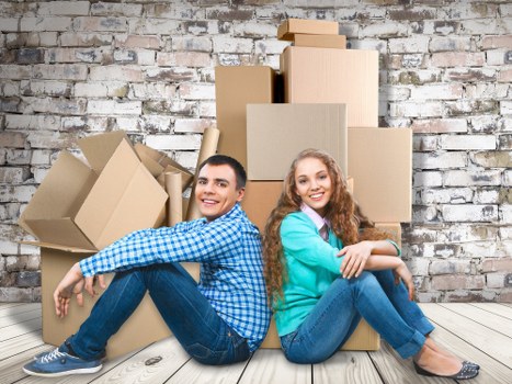Packed office equipment and furniture prepared for a move in Primrose Hill