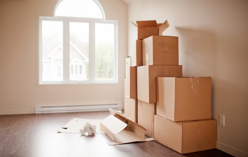 Packed moving boxes and furniture for a Primrose Hill home relocation