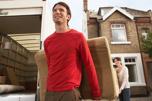 Packed boxes and furniture ready for a Primrose Hill removals van