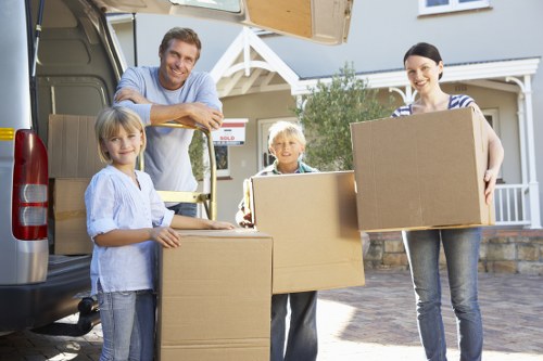 Packed boxes and wrapped furniture ready for a local house move