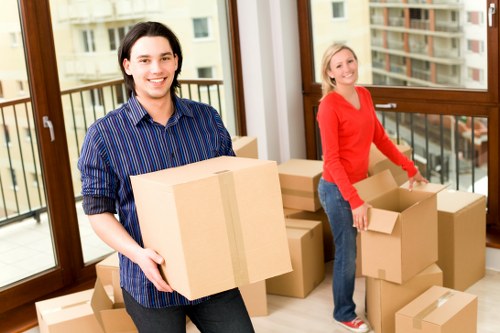 Organised moving boxes ready for unpacking in a Primrose Hill office or apartment