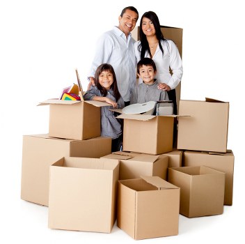 Packed boxes and furniture loaded into a removal truck